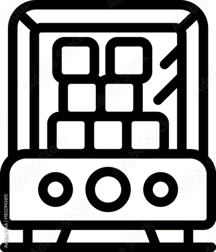 Sugar cubes drying in a specialized machine, showcasing an essential step in industrial sugar production