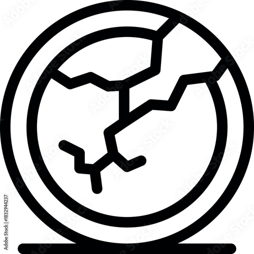 Broken plate lying on the floor, showing cracks spreading across its surface