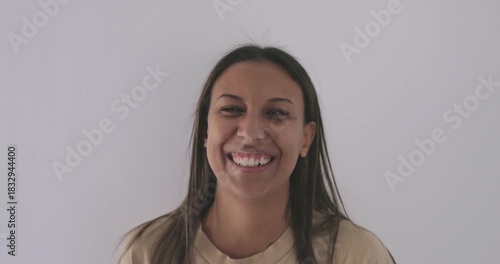 Happy young latin woman having fun smiling on camera at home - Lifestyle and happiness concept