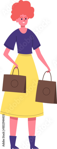 Woman holding shopping purchases enjoying retail therapy