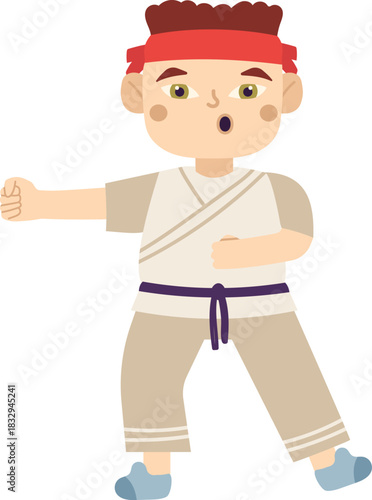 Boy practicing martial arts with a determined expression