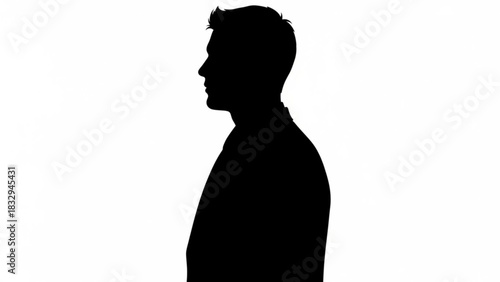 Silhouette of a man in a suit jacket standing in profile against a white background image view