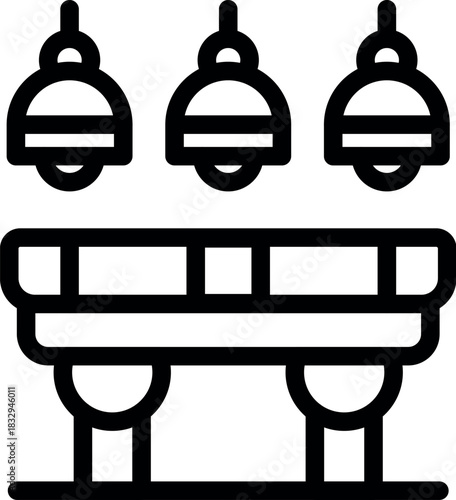 Minimalist interior design featuring three hanging lamps illuminating a modern table, creating a stylish and functional space