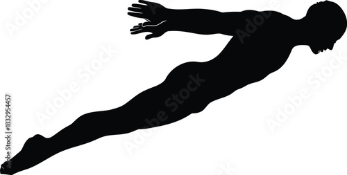 Silhouette of a man diving or swimming