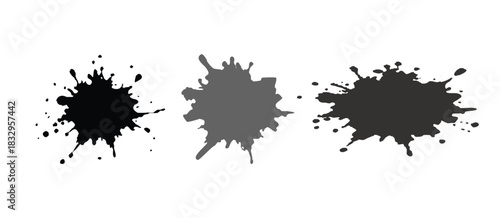 Three abstract ink blots in varying shades of gray, isolated on a white background space
