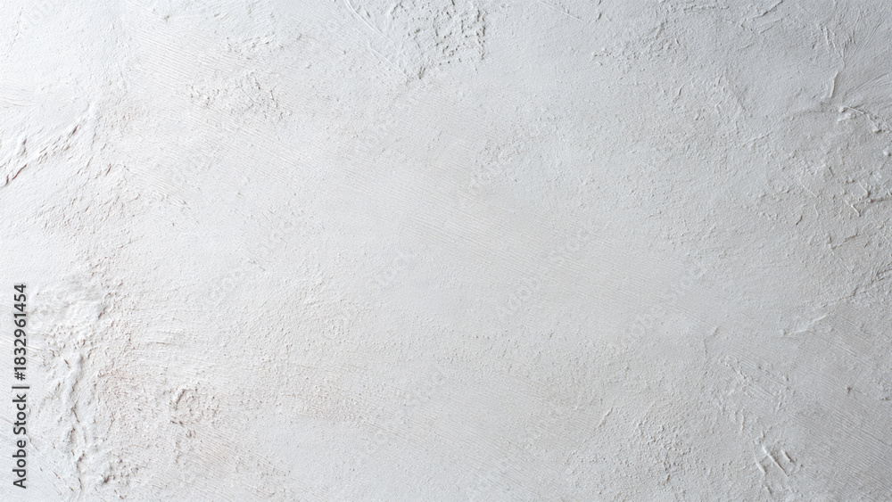 Fototapeta premium Bright white rough textured surface with subtle shadows and an abstract, uneven finish. Perfect for backgrounds and artistic overlays.
