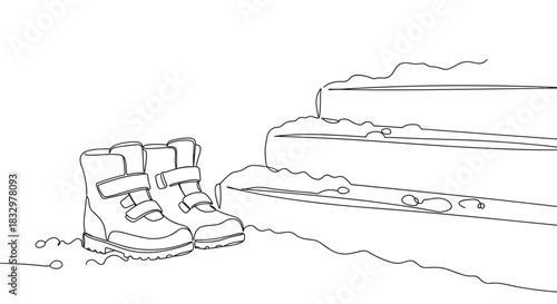 A pair of winter boots left on snow-covered steps during a cold day, showcasing their sturdy design and contrasting textures in a winter setting on a transparent background.