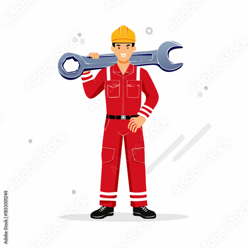 Smiling construction worker in red overalls carrying large wrench on shoulder in bright studio setting, showcasing skilled labor and positive attitude.