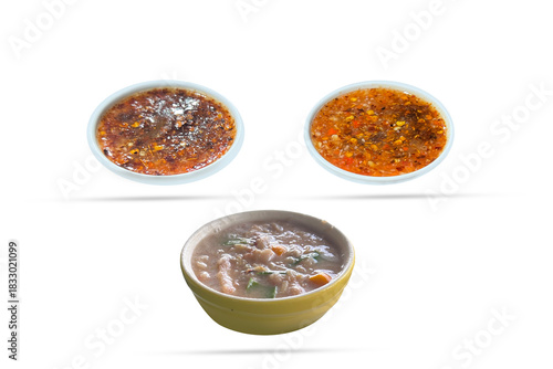 Selection of Thai Spicy Chili Dipping Sauces and Curry Isolated on White