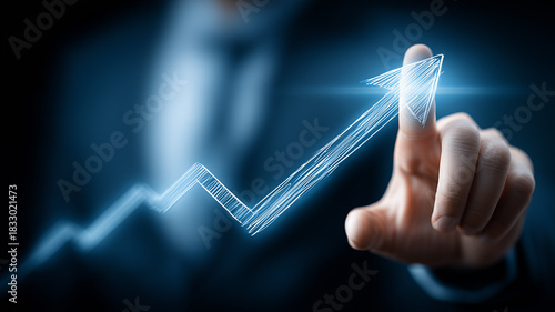 A dynamic growth concept illustrated through a hand drawing an ascending arrow symbolizing progress advancement and successful performance in a strategic business environment.
