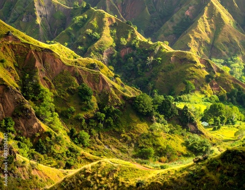 Lush Mountainous Landscape with Green Vegetation and Dramatic Terrain Features