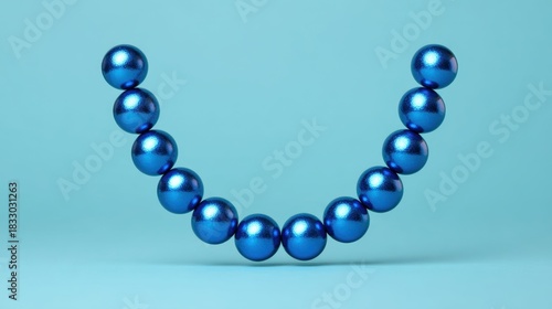 Floating metallic blue spheres creating a symbolic arc for hanukkah celebration in a minimalist environment