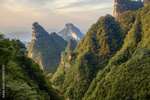 Lush mountain view from the top of Tianmen Mountain in Zhangjiajie, Hunan, China during sunset