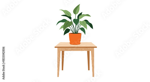 Green leafy houseplant in a decorative orange pot placed on a simple wooden table, isolated on a white background for interior design.