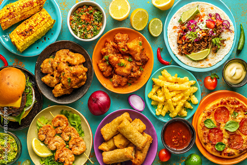 Wallpaper Mural Colorful assorted fast food flat lay on table Torontodigital.ca