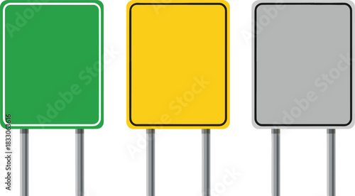 Three blank traffic signs green yellow and gray on posts empty