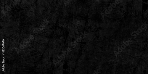 Black dark grunge stone texture with rough, natural crack wall surface background. uneven pattern resembling weathered black rock or charcoal. Panorama black canvas slate texture. marble background.