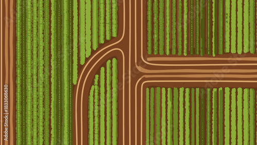 Aerial view of agricultural fields with vibrant green crops and brown soil