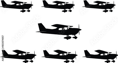 Multiple black silhouette small propeller airplanes arranged in a grid pattern aircraft