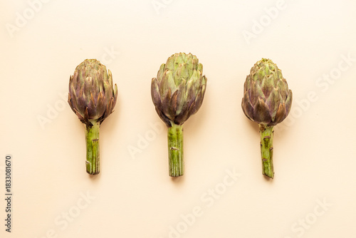 Wallpaper Mural Top view of tree whole heads of purple artichokes. Vegetable ready to cook Torontodigital.ca