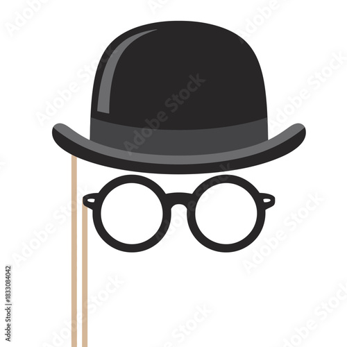 A prop bowler hat and round glasses on a stick for a costume party.