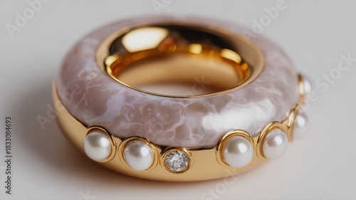 Elegant Pearl and Diamond Ring with Unique Design and Gold Finish