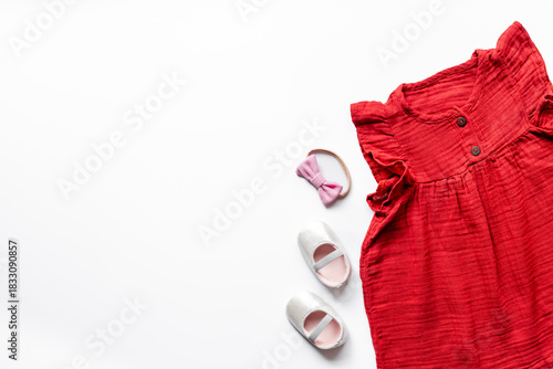 Wallpaper Mural Flat lay of summer baby girl clothes - red cotton muslin dress and shoes, top view Torontodigital.ca