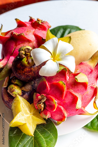 Wallpaper Mural Set of tropical fruit on white wooden table , top view. Pitaya fruit, lychee, mangosteen, mango Torontodigital.ca