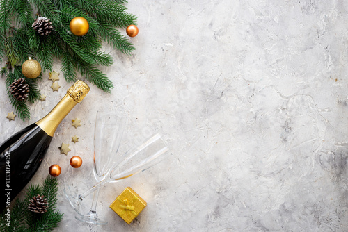 Wallpaper Mural Christmas bottle of champagne with two glasses and fir tree branches, top view. Happy New Year and Merry Christmas decoration Torontodigital.ca