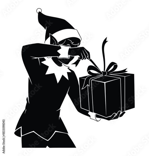 A silhouette of a Christmas elf carefully untying a ribbon on a beautifully wrapped gift ready for the holiday season