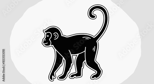 Silhouette of a Monkey with a Curled Tail.