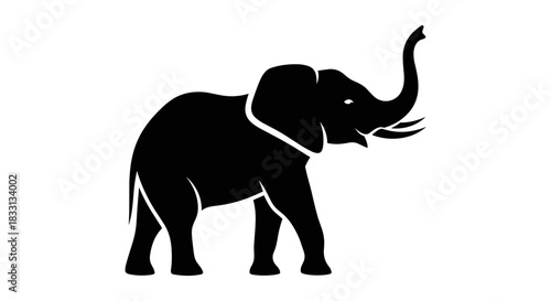 Silhouette of an Elephant with Trunk Raised in Black and White.