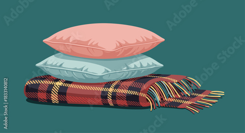 Cozy stack of two soft pillows, one pink and one light blue, resting on a neatly folded plaid blanket against a warm teal background.