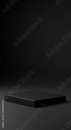 Minimalist black podium for product display on dark background s
