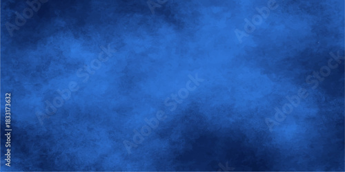 Dark blue grunge background with a wispy cloud and mist texture
