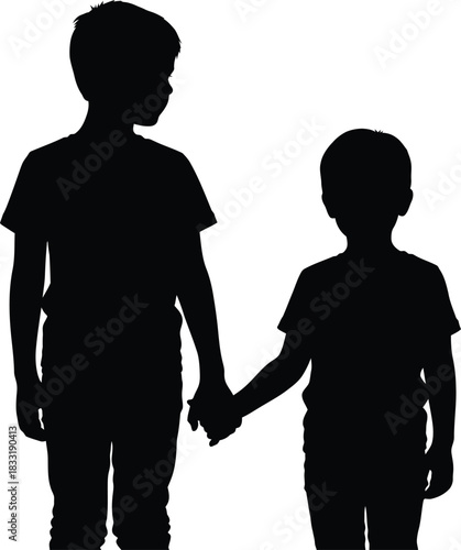 Silhouette of two young boys holding hands together lovingly