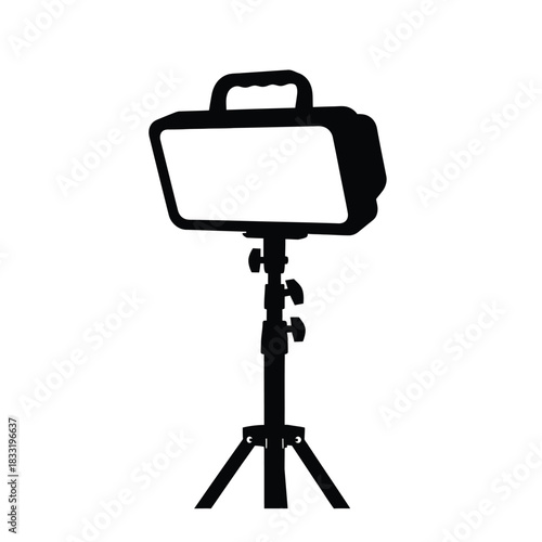 Black silhouette studio light on tripod vector