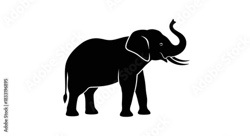 Majestic Elephant Silhouette with Trunk Raised in Celebration.