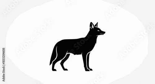 Silhouette of a Standing Black Wolf on White.