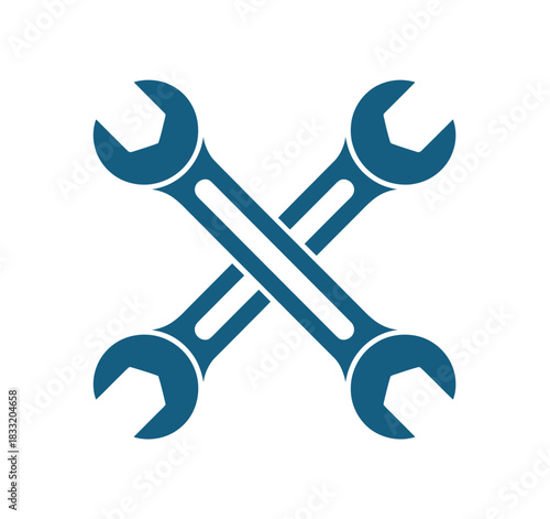 Two crossed wrenches on a white background symbolizing tools and mechanical work.