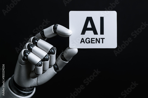Ai agent robot hand card sleek metallic hand presenting a compact card evoking futuristic confidence and technological promise against a black background