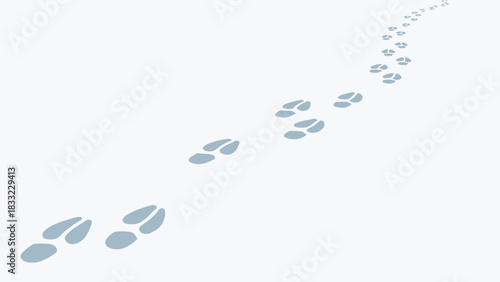 Follow the winter wonderland trail of animal tracks in the fresh snow, a peaceful and serene snowy landscape for your seasonal designs and projects