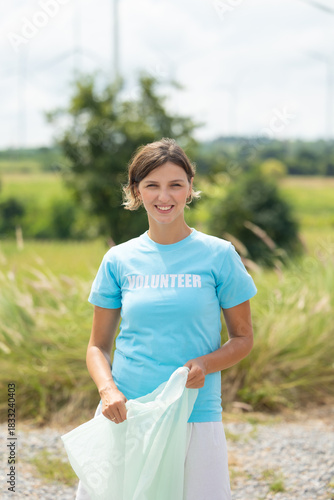 Portrait caucasian woman, volunteer and smile with eco friend. green and waste management. Cleaning, charity community service event, ngo business and outreach, Group Diverse people meeting at park