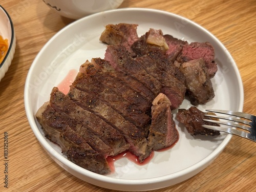 Homemade Grilled Steak on Wooden Table