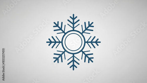 A stylized blue snowflake icon with a circular center is displayed on a light gray gradient background representing winter and cold