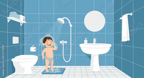 A cheerful young boy happily enjoys taking a shower in a bright, clean bathroom with blue tiled walls and modern fixtures, smiling with water running over his head.
