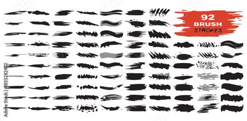 Collection of ninety two black brush strokes and lines for artistic design elements
