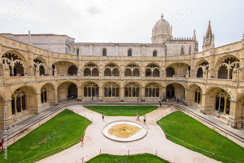 Lisbon, Portugal. Wide-angle view from the upper gallery of Jeronimos Monastery showing the twin-level arcades and the central cloister courtyard of this iconic 16th-century Manueline monastery