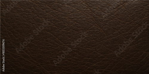 Dark brown leather texture pattern of a natural, rough, and vintage textile material backdrop