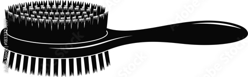 A simple black and white illustration of a shoe cleaning brush